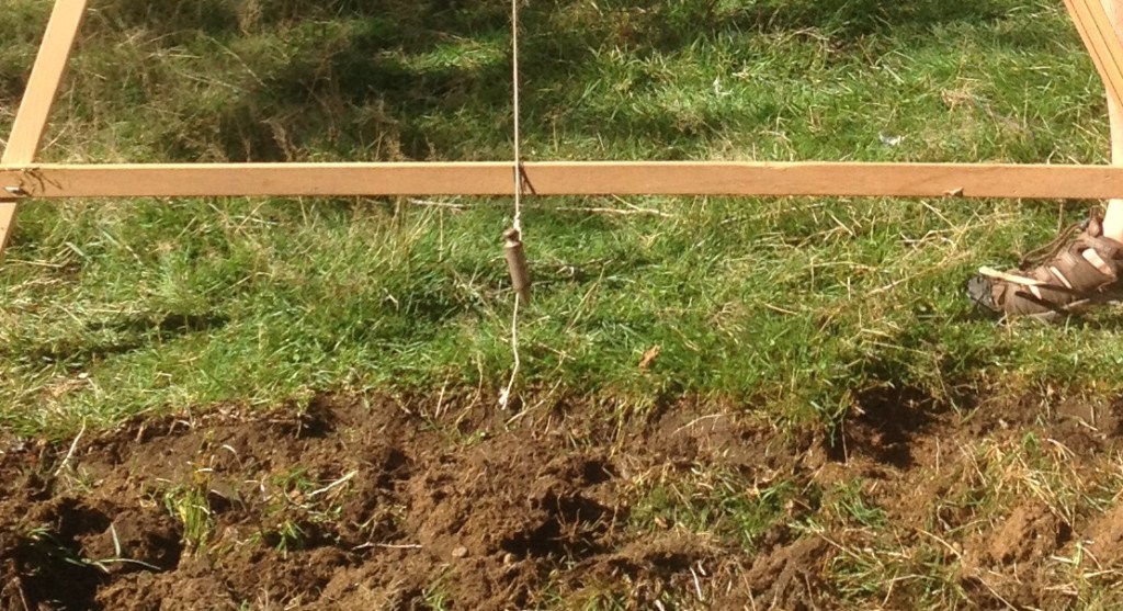 Only 2 things to check when making an A-frame. 1. The angles can't move, I used 3 nails to be sure, and 2. The Level line is drawn on ground you've actually checked is level. I used the garage that i checked with a spit level.